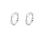 Pendientes pequeños rizados con circonitas brillantes